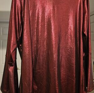 Ashley Stewart chili pepper red blouse.  It has bell sleeves and 1 open slit